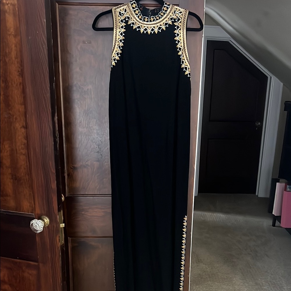 Chic Black Dress with Gold Detailing